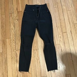 High rise lucky brand black skinny jeans with rips at the knees